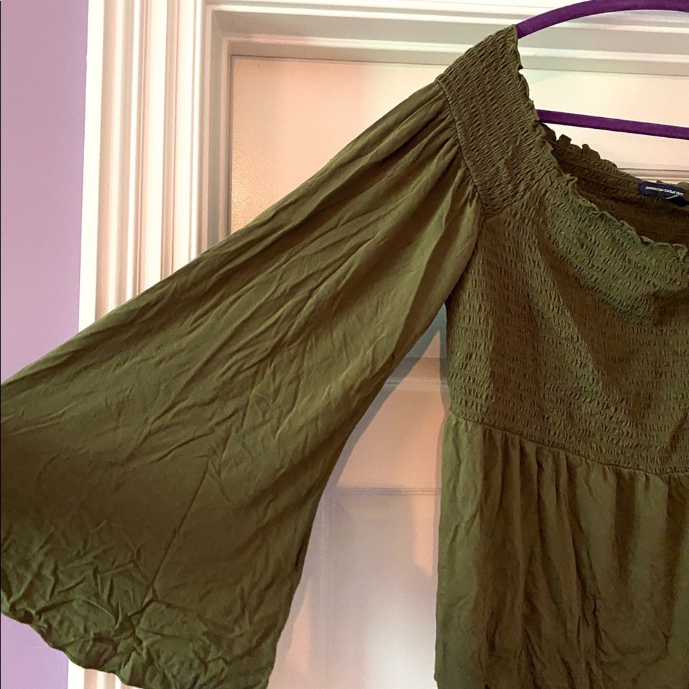 deep green bell-sleeve ruched top